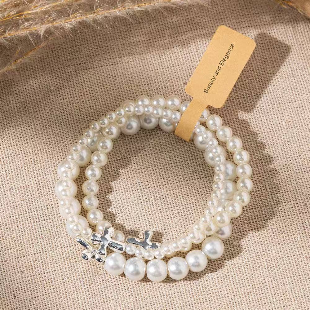 Elegant Stackable Pearl Cross Bracelets