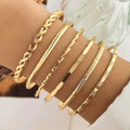 Gold Layered Bangle Set stacked on wrist showing mixed textures